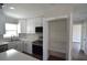 Kitchen with white cabinets, stainless steel appliances, and a pantry at 894 Superior St, Deltona, FL 32725
