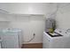 Bright laundry room with new washer and dryer and water heater at 894 Superior St, Deltona, FL 32725