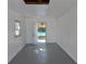 Bright, open room, freshly painted, offering backyard access and potential for customization at 894 Superior St, Deltona, FL 32725
