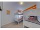 bedroom with built in bunk beds with striped bedding and decor at 926 Balmoral Dr, Davenport, FL 33896