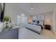 Bright main bedroom with vaulted ceiling, large window, and comfortable bed at 926 Balmoral Dr, Davenport, FL 33896