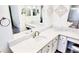 Clean bathroom with extended white vanity and well-lit mirror at 10237 Sw 63Rd Ave, Ocala, FL 34476