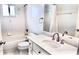 Bright bathroom with white vanity, modern fixtures, and a shower-tub combination at 10237 Sw 63Rd Ave, Ocala, FL 34476