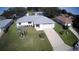 Aerial shot of home with manicured lawn and mature landscaping at 10237 Sw 63Rd Ave, Ocala, FL 34476