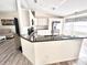 Open kitchen featuring granite countertops, white cabinets, and stainless steel appliances at 10237 Sw 63Rd Ave, Ocala, FL 34476