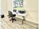This office room has a large window, desk, printer, and office chair to support your working at home at 10237 Sw 63Rd Ave, Ocala, FL 34476