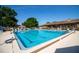 Expansive outdoor pool offers a refreshing escape with ample seating for residents and their guests to enjoy at 10237 Sw 63Rd Ave, Ocala, FL 34476