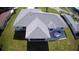 Aerial showing back of a gray roof home with screened in porch and patio at 10237 Sw 63Rd Ave, Ocala, FL 34476