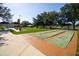 Community shuffleboard courts on a sunny day, perfect for recreation and outdoor enjoyment for residents at 10237 Sw 63Rd Ave, Ocala, FL 34476