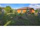 Spacious backyard with green lawn perfect for outdoor activities at 1107 Dartford Dr, Kissimmee, FL 34758