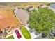 Aerial view of home with well-maintained lawn and screened pool at 1113 Casterton Cir, Davenport, FL 33897