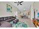 Spacious living area seamlessly connects to the dining room with open floor plan at 1113 Casterton Cir, Davenport, FL 33897
