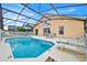 Inviting pool area with lounge chairs and dining, perfect for outdoor relaxation at 1113 Casterton Cir, Davenport, FL 33897