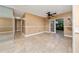 Bright dining room with tile flooring, neutral walls, ceiling fan and sliding doors to the patio at 1209 Marygon St, Kissimmee, FL 34744