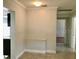 The view highlights the entrance, with the kitchen on the left and the hallway on the right at 1309 N Thacker Ave, Kissimmee, FL 34741