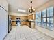 Open kitchen featuring stainless steel appliances, ample cabinet space, and large windows at 1784 Sparkling Water Cir, Ocoee, FL 34761
