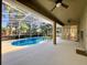 Inviting screened-in pool area with a spacious patio, perfect for outdoor living and entertaining at 1784 Sparkling Water Cir, Ocoee, FL 34761