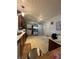 Spacious kitchen featuring a tile floor, and stainless steel refrigerator at 1821 N Reedy Lake Blvd, Frostproof, FL 33843