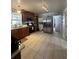 Spacious kitchen featuring a tile floor, and stainless steel refrigerator at 1821 N Reedy Lake Blvd, Frostproof, FL 33843