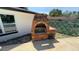 Close-up of a brick outdoor barbecue, perfect for grilling and entertaining in the backyard at 2074 Dunsford Dr, Orlando, FL 32808