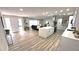 Bright, open concept living room and kitchen area with modern finishes and ample space at 2074 Dunsford Dr, Orlando, FL 32808