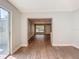 Bright living area with an open floor plan and hardwood-style flooring at 220 Hillside Dr, Lakeland, FL 33803