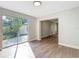 Spacious living area with sliding glass doors offering plenty of natural light at 220 Hillside Dr, Lakeland, FL 33803