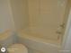 Clean bathroom with a bathtub and toilet at 236 Rontunda Dr, Kissimmee, FL 34758