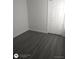 Cozy bedroom featuring wood-look flooring and a closet at 236 Rontunda Dr, Kissimmee, FL 34758