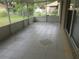 Spacious screened lanai with tiled floors, perfect for outdoor relaxation and entertaining at 236 Rontunda Dr, Kissimmee, FL 34758