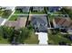 Beautiful home featuring mature landscaping and a long driveway at 242 Anson Dr, Kissimmee, FL 34758