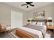 Relaxing bedroom with a cozy bed, modern decor, and a serene atmosphere at 242 Anson Dr, Kissimmee, FL 34758