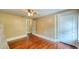 Bedroom featuring hardwood floors, and natural light from double windows at 2652 N Woodland Blvd, Deland, FL 32720