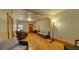 Bright living room with hardwood floors and comfortable seating at 2652 N Woodland Blvd, Deland, FL 32720