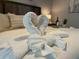 Close-up view of the bedding and mattress in this bedroom at 2798 Club Cortile Cir # A, Kissimmee, FL 34746