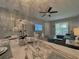 Dining area leading into a living area, featuring wood floors, and bright natural light at 2798 Club Cortile Cir # A, Kissimmee, FL 34746