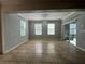 Bright dining room with tile floors, chandelier lighting, and sliding glass doors to outdoor patio at 3003 Cobham Rd, Kissimmee, FL 34758