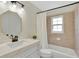 Renovated bathroom with new vanity, modern faucet, and new tiling at 3134 Koval Ct, Orlando, FL 32837