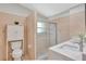 Bathroom with a standing shower and a white vanity with double sinks at 3134 Koval Ct, Orlando, FL 32837