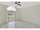 Spacious room with tile flooring and a view to the front yard at 3134 Koval Ct, Orlando, FL 32837