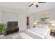 Elegant bedroom featuring tile floors, a ceiling fan and an elegant decor at 3134 Koval Ct, Orlando, FL 32837