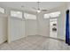 Open bonus room with access to kitchen, great for entertaining guests at 3134 Koval Ct, Orlando, FL 32837