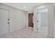 Spacious foyer featuring tile flooring, closet and beautiful front door with glass inserts at 3134 Koval Ct, Orlando, FL 32837