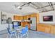 Spacious garage featuring kitchen and dining space, with room for other uses at 3134 Koval Ct, Orlando, FL 32837