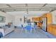 Open garage featuring laundry, kitchen and dining space, and plenty of room for storage at 3134 Koval Ct, Orlando, FL 32837