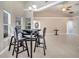 Dining area with tile floors, windows, and a table with chairs and views to the living room at 3211 Countryside View Dr, St Cloud, FL 34772
