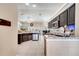 Spacious kitchen with tile flooring, stainless steel appliances, granite countertops, and plenty of counter space at 3211 Countryside View Dr, St Cloud, FL 34772