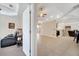 Open doorway to living room with tile floors, views of dining area and kitchen at 3211 Countryside View Dr, St Cloud, FL 34772