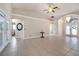 Large living room with tile flooring, neutral walls, and ceiling fan at 3211 Countryside View Dr, St Cloud, FL 34772