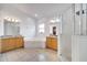 Bright main bathroom with tiled floors, vanity, soaking tub and glass-enclosed shower at 3211 Countryside View Dr, St Cloud, FL 34772